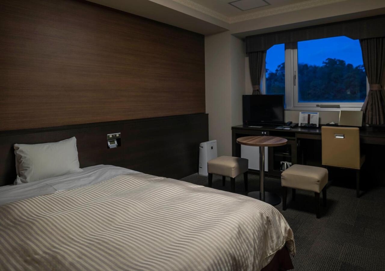 Hotel New Palace Шингу Екстериор снимка