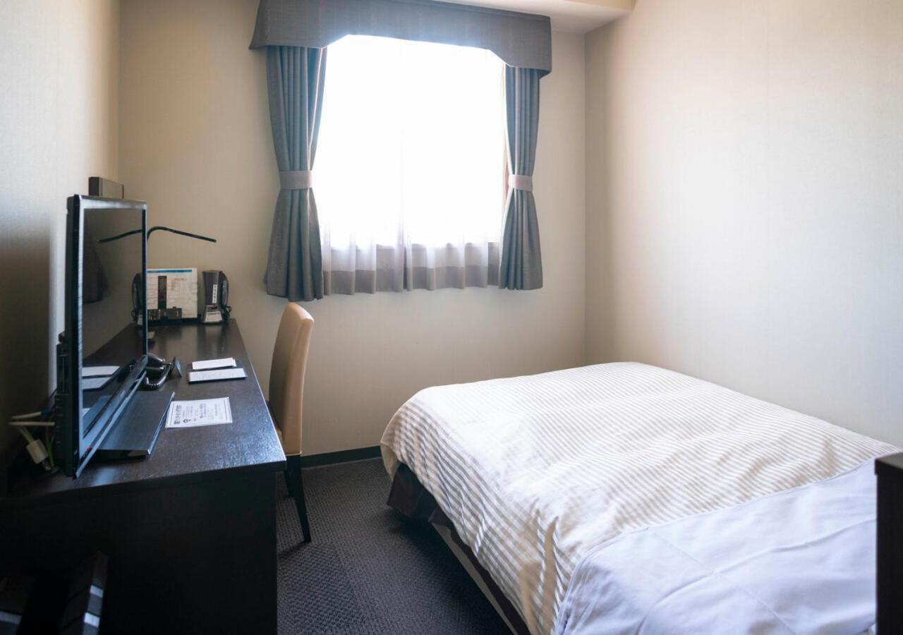Hotel New Palace Шингу Екстериор снимка