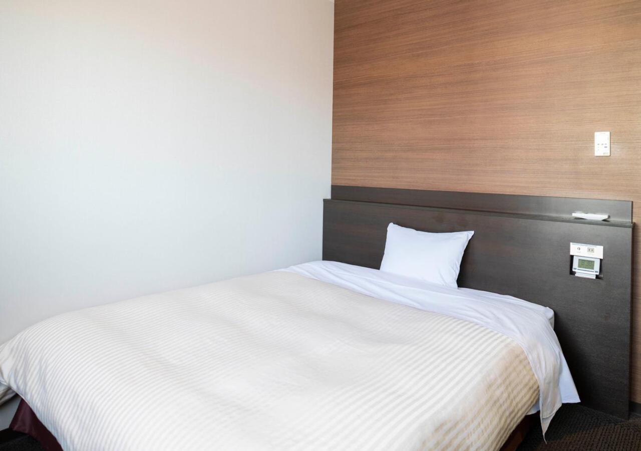 Hotel New Palace Шингу Екстериор снимка
