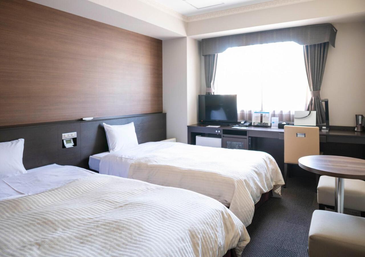Hotel New Palace Шингу Екстериор снимка