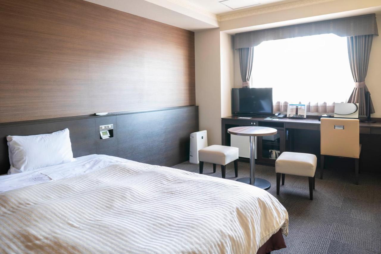 Hotel New Palace Шингу Екстериор снимка