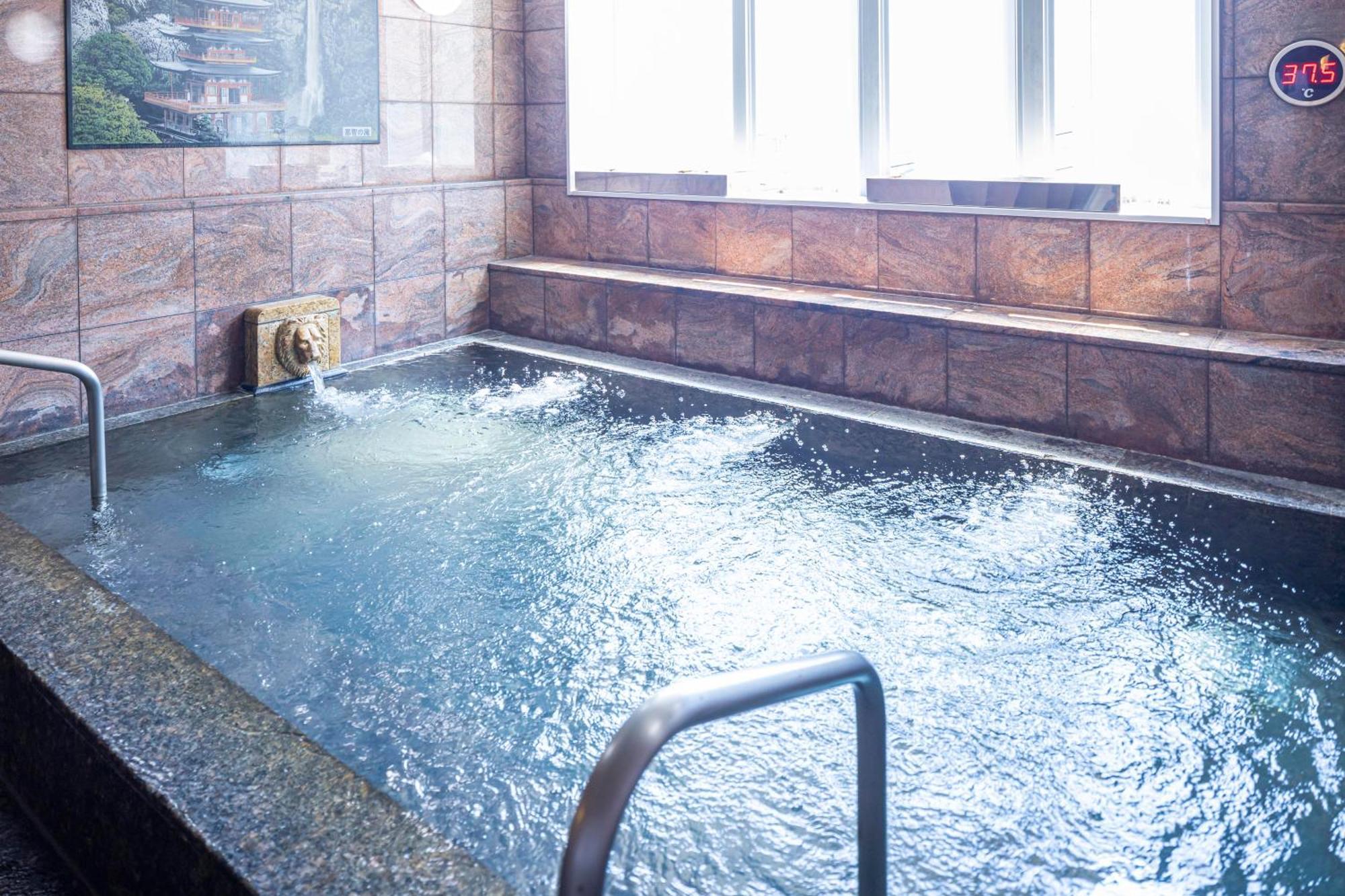 Hotel New Palace Шингу Екстериор снимка