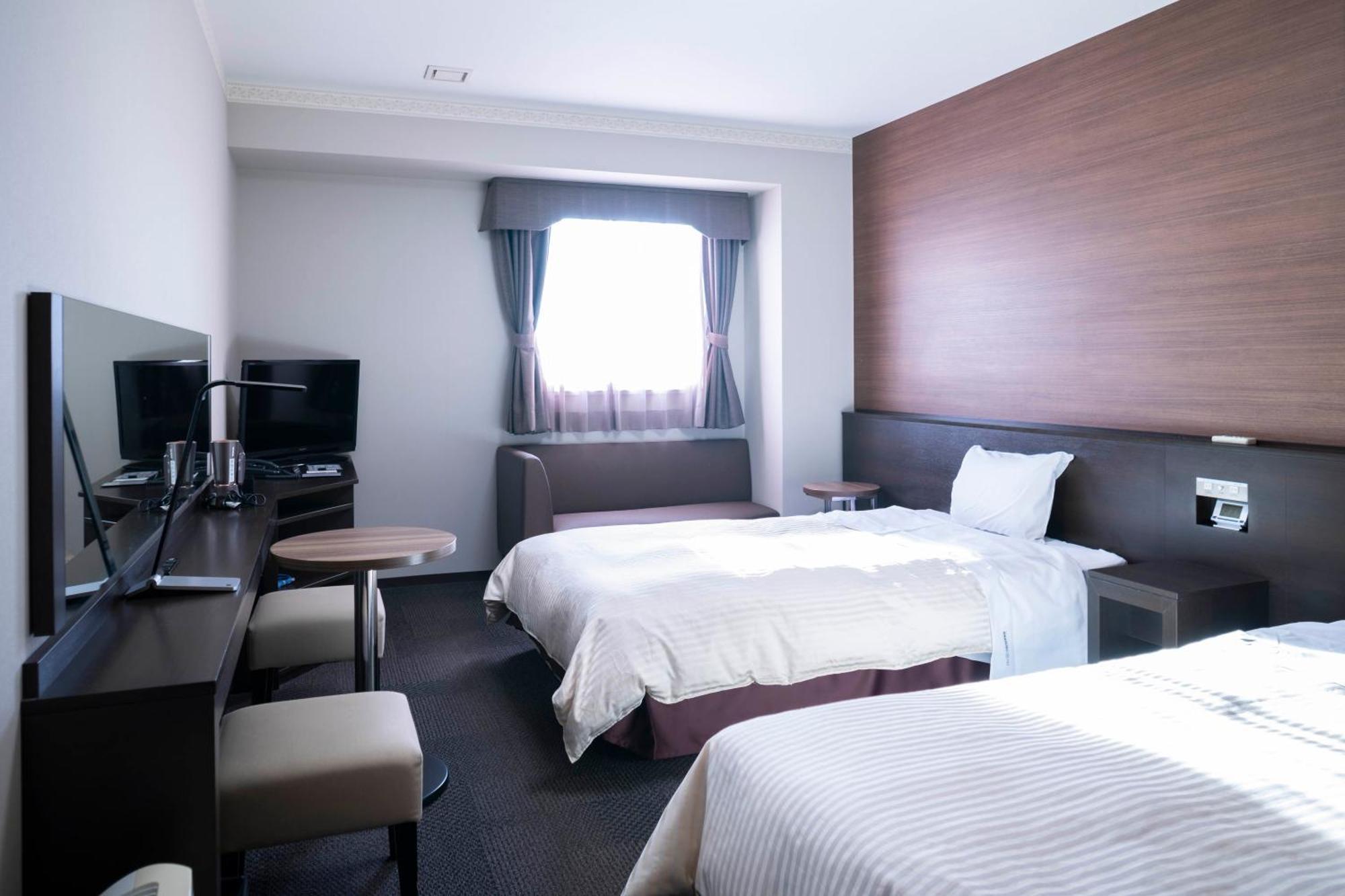 Hotel New Palace Шингу Екстериор снимка