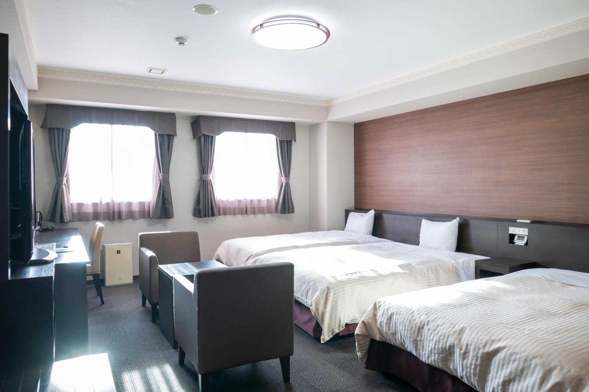 Hotel New Palace Шингу Екстериор снимка
