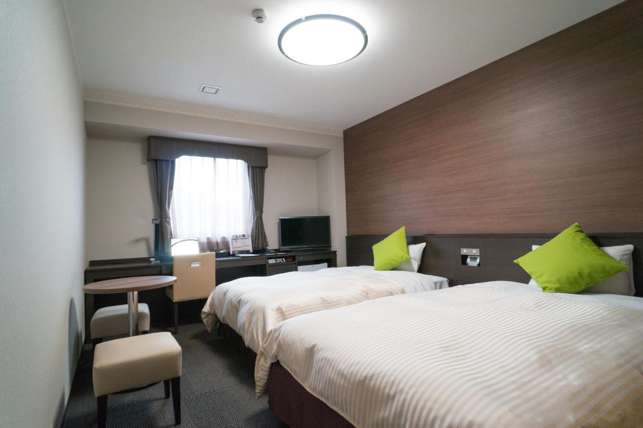 Hotel New Palace Шингу Екстериор снимка